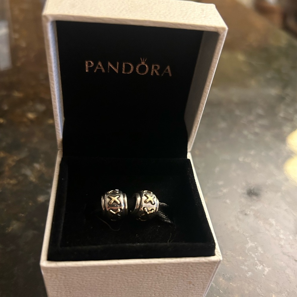 (2) Pandora X “stitches” charms sterling and gold